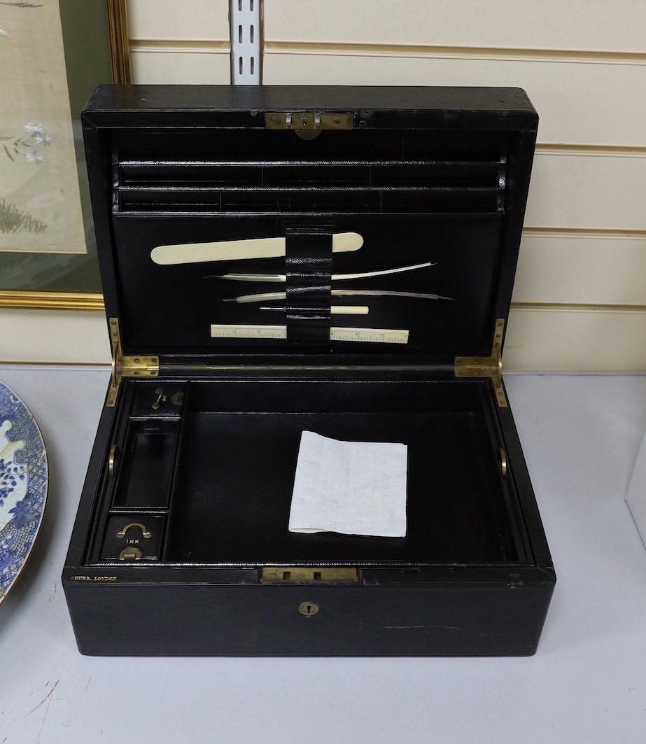 A Victorian leather-mounted stationary casket by Chubb, London, 41cms wide x 28 cms x 17cms deep